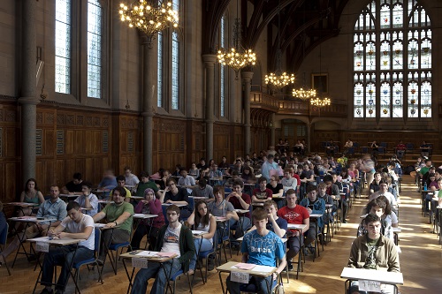 Students doing exams in exam hall